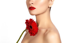 Close-up Beauty Photo Sexy Woman With Red Lips, Lipstick And Beautiful Red Flower. Spa Clean Skin