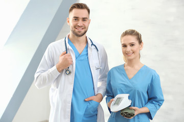 Poster - Doctor and medical assistant in clinic