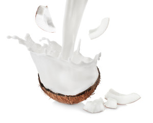 Wall Mural - Coconut half and pieces on white background