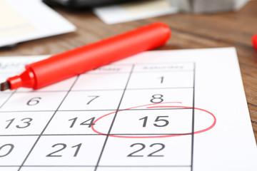 Poster - Marked calendar on table. Tax concept