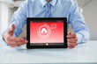 © vectorfusionart - Composite image of businessman showing digital tablet