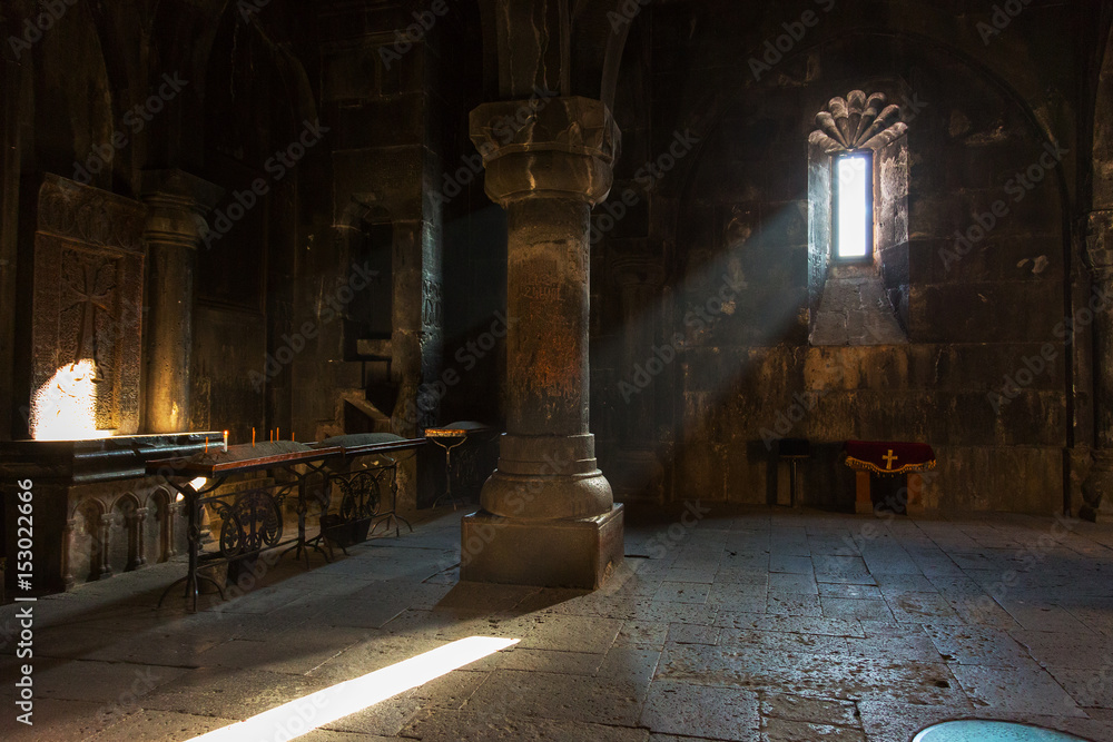 Interior of the old church in the monastery of Geghard, Armenia - obrazy, fototapety, plakaty 