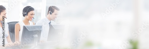 Fotografía Call centre employees smiling while sitting