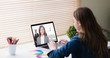 © vectorfusionart - Businesswoman video conferencing in office