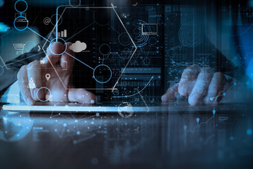 Poster - businessman hand working with modern laptop computer in modern office with virtual icon diagram