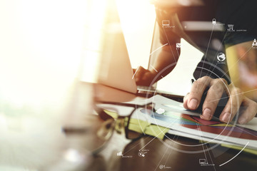 Poster - businessman working with mobile phone and digital tablet and laptop computer on wooden desk in modern office with virtual icon diagram