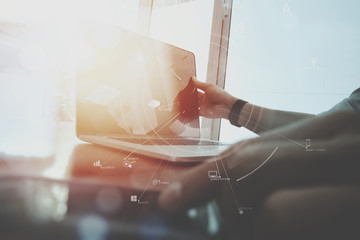 Poster - businessman working with mobile phone and digital tablet and laptop computer on wooden desk in modern office with virtual icon diagram