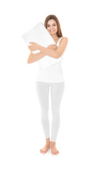 Wall Mural - Young beautiful woman with orthopedic pillow on white background. Healthy posture concept