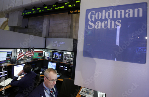 Traders Work At The Goldman Sachs Stall On The Floor Of The New