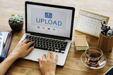 Fototapeta  - Upload is a file transfer to the internet.