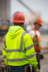 construction supervisor reviewing construction work