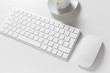 © fotofabrika - Computer keyboard and mouse on top of white desktop