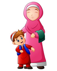 Wall Mural - A muslim women hold her son head and ready to go to mosque