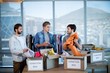 © WavebreakMediaMicro - Creative business team sorting clothes in donation box
