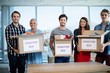 © WavebreakMediaMicro - Creative business team holding donation box in office