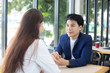 © Jestercine - Asian business people at reatuarant, Woman interview businessman for working job, Portrait business concept, 20-30 year old.