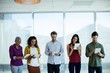 © WavebreakMediaMicro - Creative business team using digital tablet in office