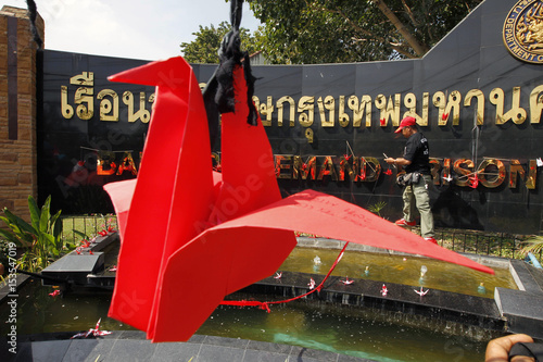 A Thai Anti Government Red Shirt Protester Places Red