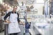 © Cavan Images - Portrait of chef standing at restaurant kitchen