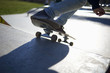 © Cavan Images - Low section of girl skateboarding on sports ramp at park