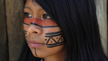 Closeup Face Of Native Brazilian Woman At An Indigenous Tribe In The Amazon