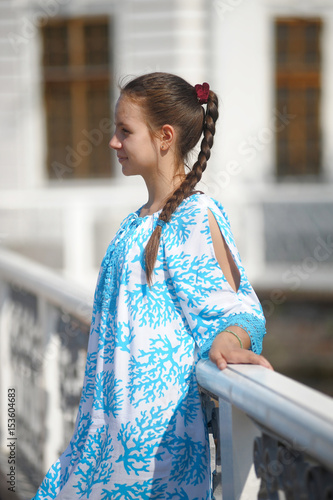 Cute Teen Girl In Blue Dress With Pigtail Hairstyle Buy This