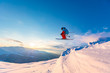 Good skiing in the snowy mountains, Carpathians, Ukraine. Beautiful winter sunset, incredible ski jump.