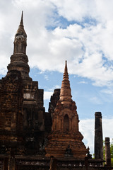 Wall Mural - Sukhothai historical park the old town of Thailand Ancient Buddha Statue at Wat Mahathat in Sukhothai Historical Park,Thailand