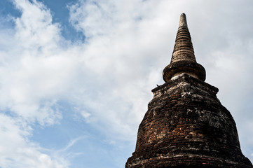 Wall Mural - Sukhothai historical park the old town of Thailand Ancient Buddha Statue at Wat Mahathat in Sukhothai Historical Park,Thailand