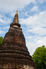 Wall Mural - Sukhothai historical park the old town of Thailand Ancient Buddha Statue at Wat Mahathat in Sukhothai Historical Park,Thailand