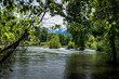 Wenatchee River running past Leavenworth, Washington with the Cascade Mountain Range in the distance. 