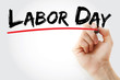 © dizain - Hand writing Labor Day with marker, concept background