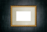 Fototapeta  - Empty gold frame on a black wooden background copy space