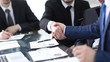 © ASDF - businessman shaking hands to seal a deal with his partner