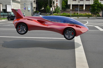 Wall Mural - Red Air Vehicle At The Parking Lot, Urban Flying Car 3d Concept, Futuristic Vehicle, Air Car Concept - 3D Rendering