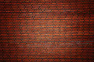  Dark red vignetted brick stone wall background