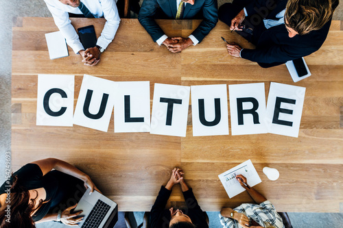 Cuadros en Lienzo Business people discussing over work culture in meeting