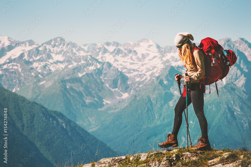 Girl Traveler hiking with backpack at rocky mountains landscape Travel Lifestyle concept adventure summer vacations outdoor - obrazy, fototapety, plakaty 