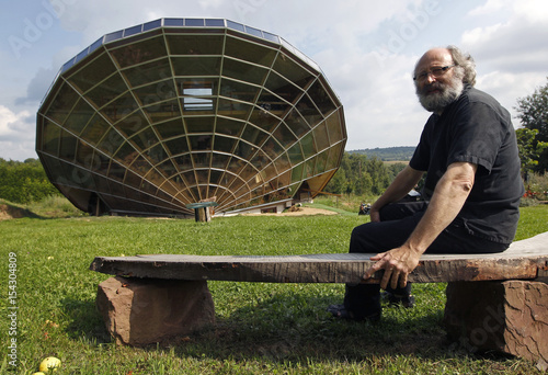 French Cabinet Maker And Dedigner Wasser Poses In Front Of His