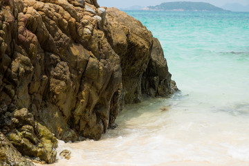 Sea wave and rock