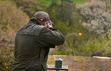 Gunman Shooting The Asphalt Pigeon..