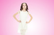 © lotosfoto - Beautiful little girl in a white dress.