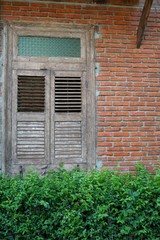 Wall Mural - Ancient wooden window A craftsman of old-fashioned carpentry.