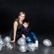 © tenrec - Mother and son are with balloons in the Studio