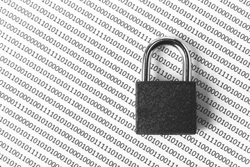  a black and white concept image that can be used to represent cyber security or the protection of software code. This image has selective focusing on the padlock