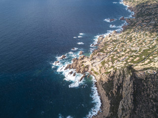 Aerial view of an Italian city on the coast of Sardinia at sunset. Costa Paradiso, Sardinia, Italy.