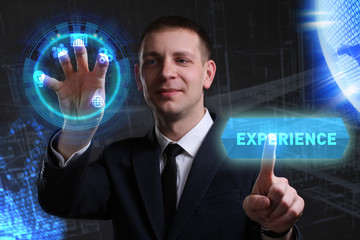 Business, Technology, Internet and network concept. Young businessman working on a virtual screen of the future and sees the inscription: Experience