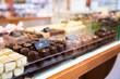Selection of chocolate in a row, shop in Belgium