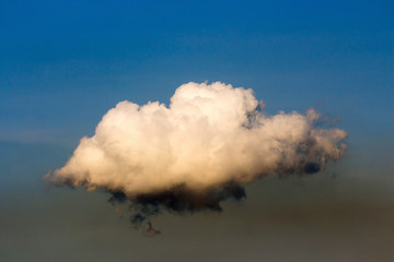 White fluffy clouds in the blue sky