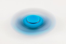 Fidget Spinner In White Isolated Background For Stress Release During Work